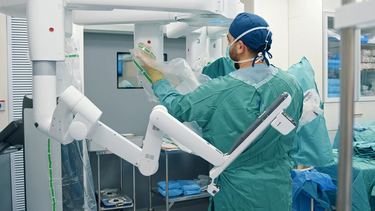 Technician preparing equipment for surgery